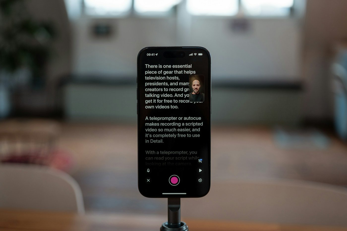 Smartphone on a stand set up to record a talking-head video
